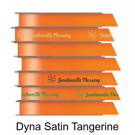 A stack of seven spools of shiny tangerine orange satin ribbon with custom messages printed on them in different colors.