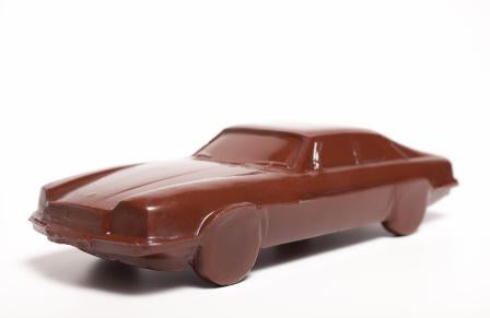 A three-dimensional chocolate molded Jaguar style car.