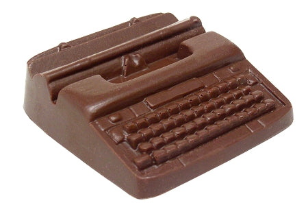 A molded chocolate typewriter has keys and carriage details.