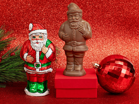 A chocolate Santa wrapped in Italian foil with details artwork of Santa in bright red, green and white.