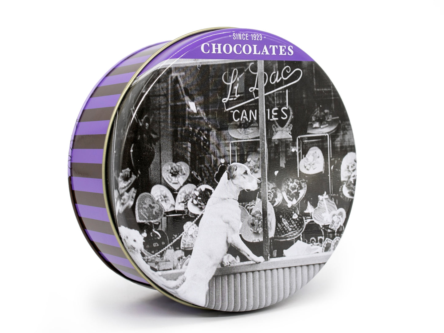 A round tin standing on its side with a photo of the original Li-Lac storefront window on the cover.