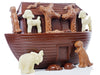 A dark chocolate ark has animals made from milk and white chocolate.