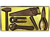 6 chocolate tools including a hammer, saw, wrench, pliers and more.