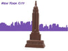 Three-dimensional chocolate molded into the shape of a very large Empire State Building.