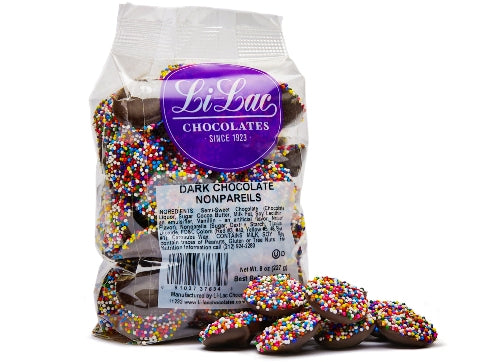 A cellophane bag of  Dark Chocolate Nonpareils.