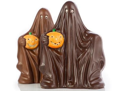 A big ghost in long, rippling robes carries a jack-o-lantern friend under one arm.