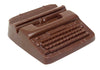 A molded chocolate typewriter has keys and carriage details. 